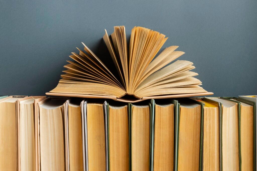 Stack of books arranged on a table