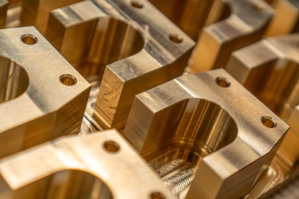 Precision machined metal parts, the kind of small buys that make DLA parts contracts easy government contracts to winClose up of precision machined metal parts