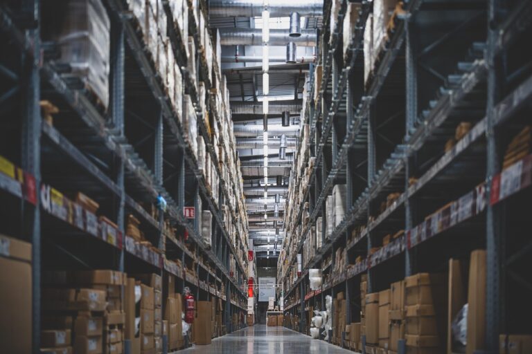 Warehouse shelves stocked with parts and supplies bought through DLA DIBBS