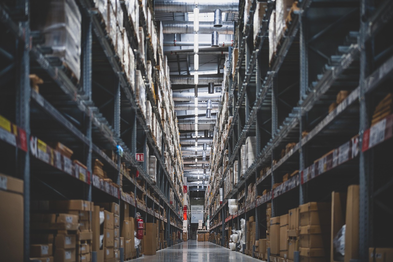 Warehouse shelves stocked with parts and supplies bought through DLA DIBBS