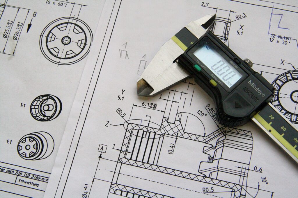 Technical drawing and calipers, like the part drawings DLA posts in cFolders