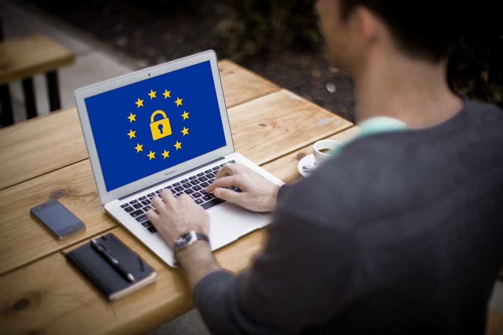 Contractor securing a laptop to meet cybersecurity compliance on military contracts
